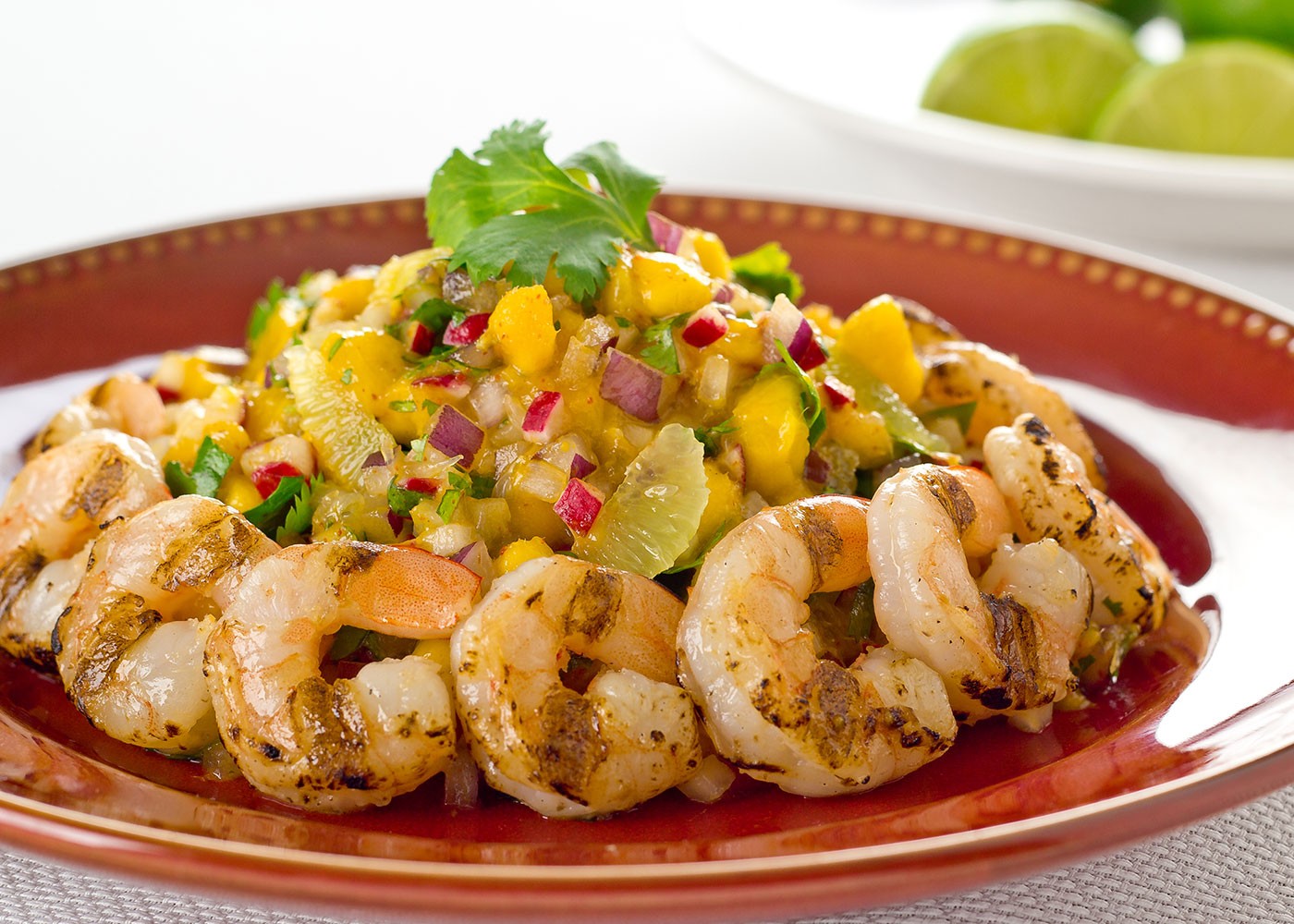 Shrimp with radish salsa on a plate