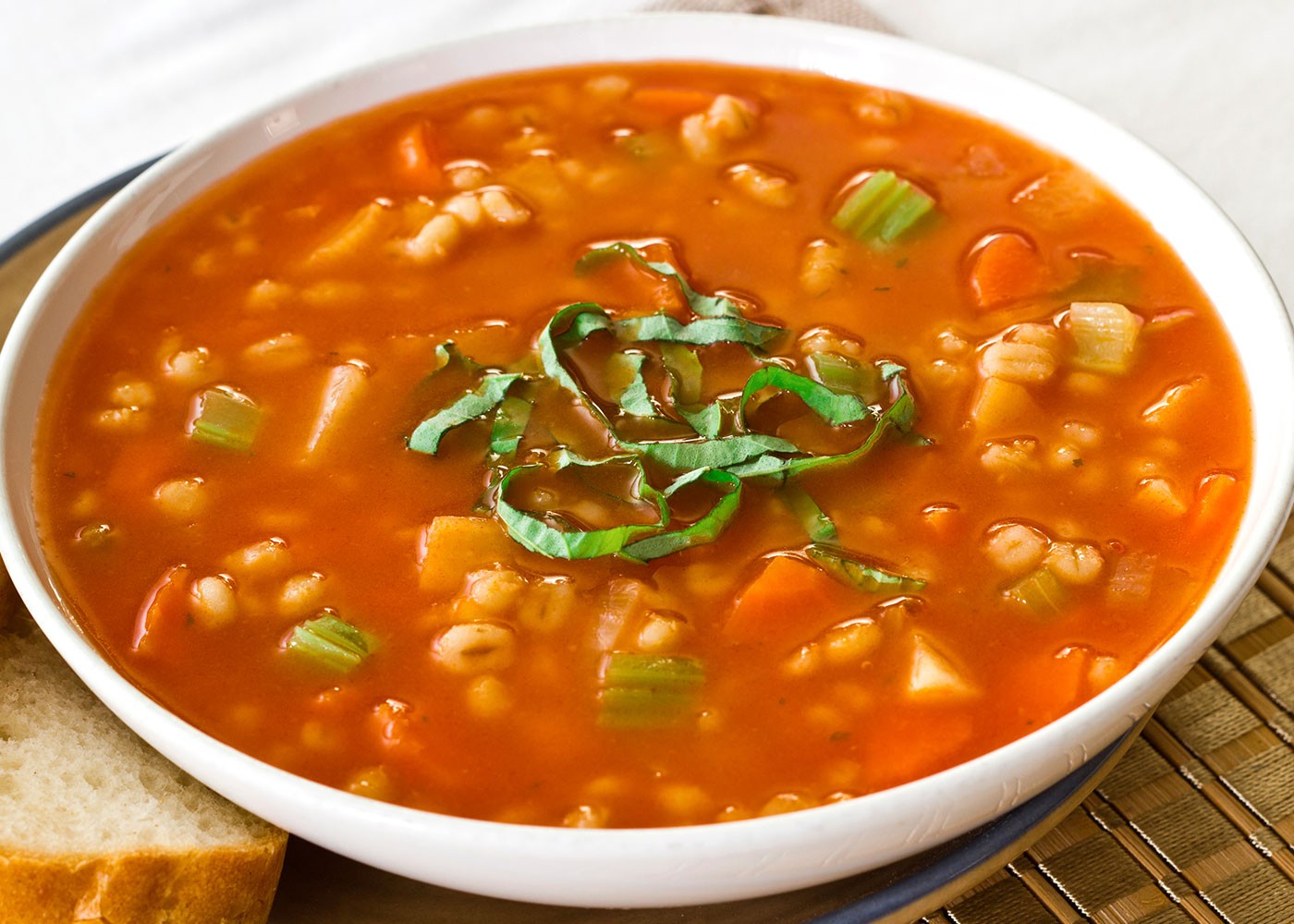 Vegetable Barley Soup with Tomato Broth in a bowl